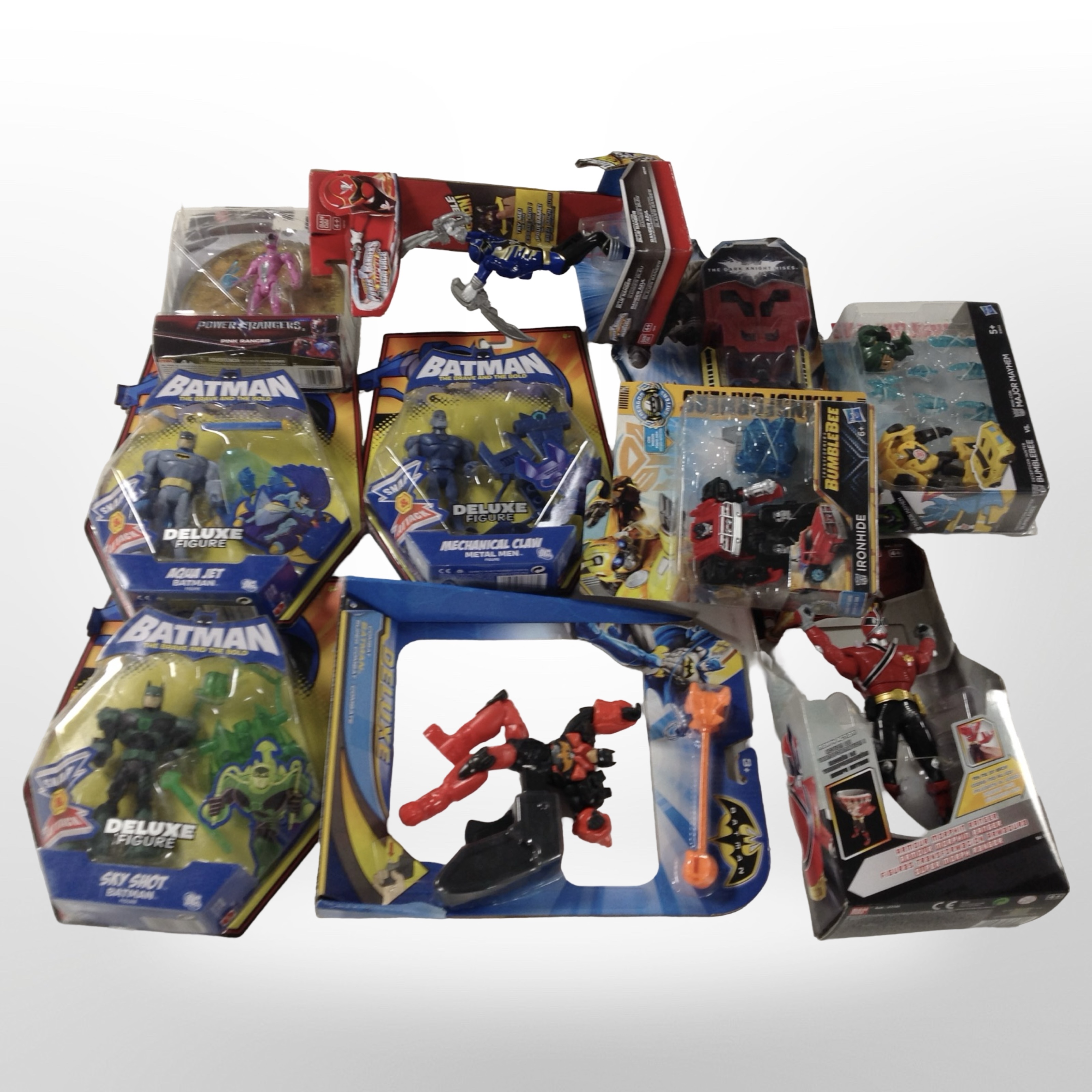 10 Hasbro, DC and Bandai figures including Batman, Transformers, Power Rangers, etc., boxed.