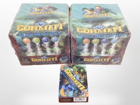 Two packs of Gormiti trading cards.