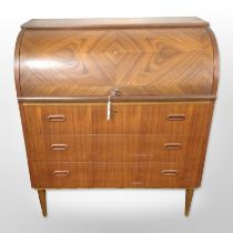 A 20th-century Danish teak cylinder-front bureau on tapered legs, 85cm wide x 46cm deep x 97cm high.