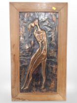 A copper relief panel depicting figures dancing, in teak frame, overall 73cm x 41cm.
