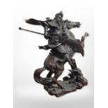 A contemporary patinated bronze figure of a Chinese warrior on horseback, height 47cm.