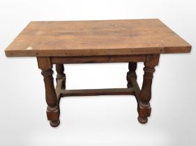 An oak refectory dining table, 120cm long x 68cm wide x 74cm high.