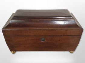 A reproduction mahogany tea caddy, width 38cm.