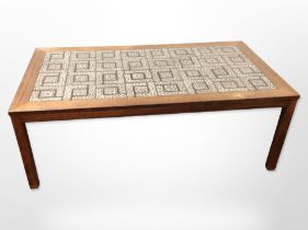 A 20th-century Danish rectangular tile-top coffee table, 137cm long x 76cm wide x 49cm high.