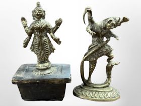 Two 19th century Tibetan cast brass devotional temple figures, tallest 10.