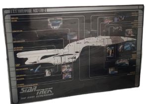 A poster depicting the Star Trek USS Enterprise, laid to card, 62cm x 93cm,