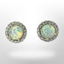 A pair of 9ct white gold opal earrings CONDITION REPORT: Moissonite stones in