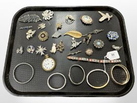 A group of costume jewellery, mosaic bracelet, owl brooch,