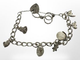 A Sterling silver charm bracelet CONDITION REPORT: 28.3g.