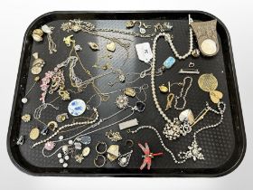 A group of costume jewellery, bracelets, necklaces, silver pendant on chain,