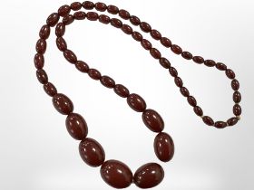 A red amber/bakelite bead necklace CONDITION REPORT: 68g