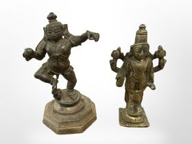 Two 19th century Tibetan cast brass devotional temple figures,