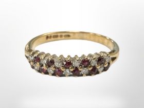 A 9ct yellow gold ruby and diamond ring, size I/J. CONDITION REPORT: 1.5g.