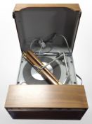 A Stella teak-cased turntable with power lead.