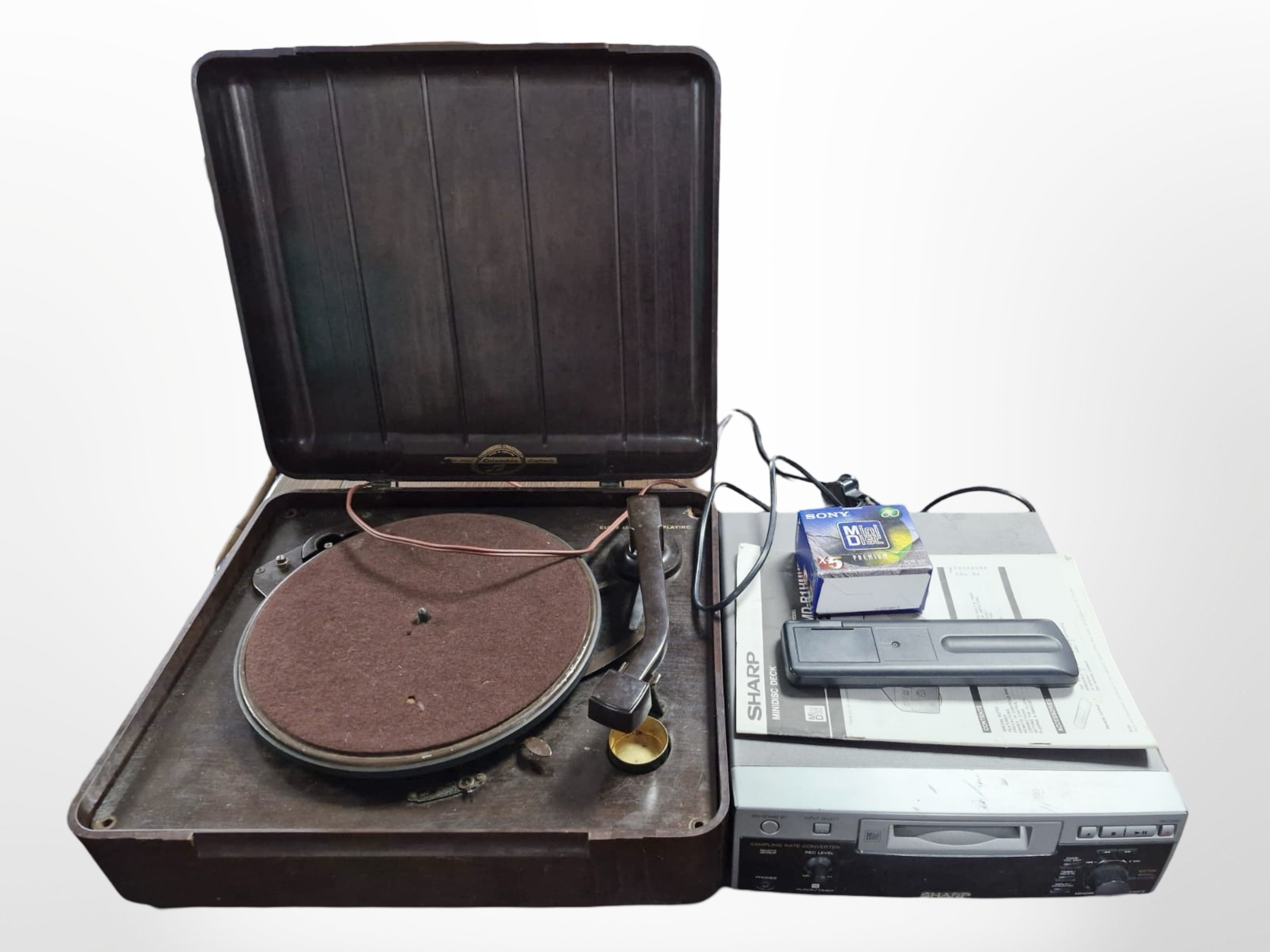 A Bakelite cased Columbia turntable and Sharp mini disc deck with ...