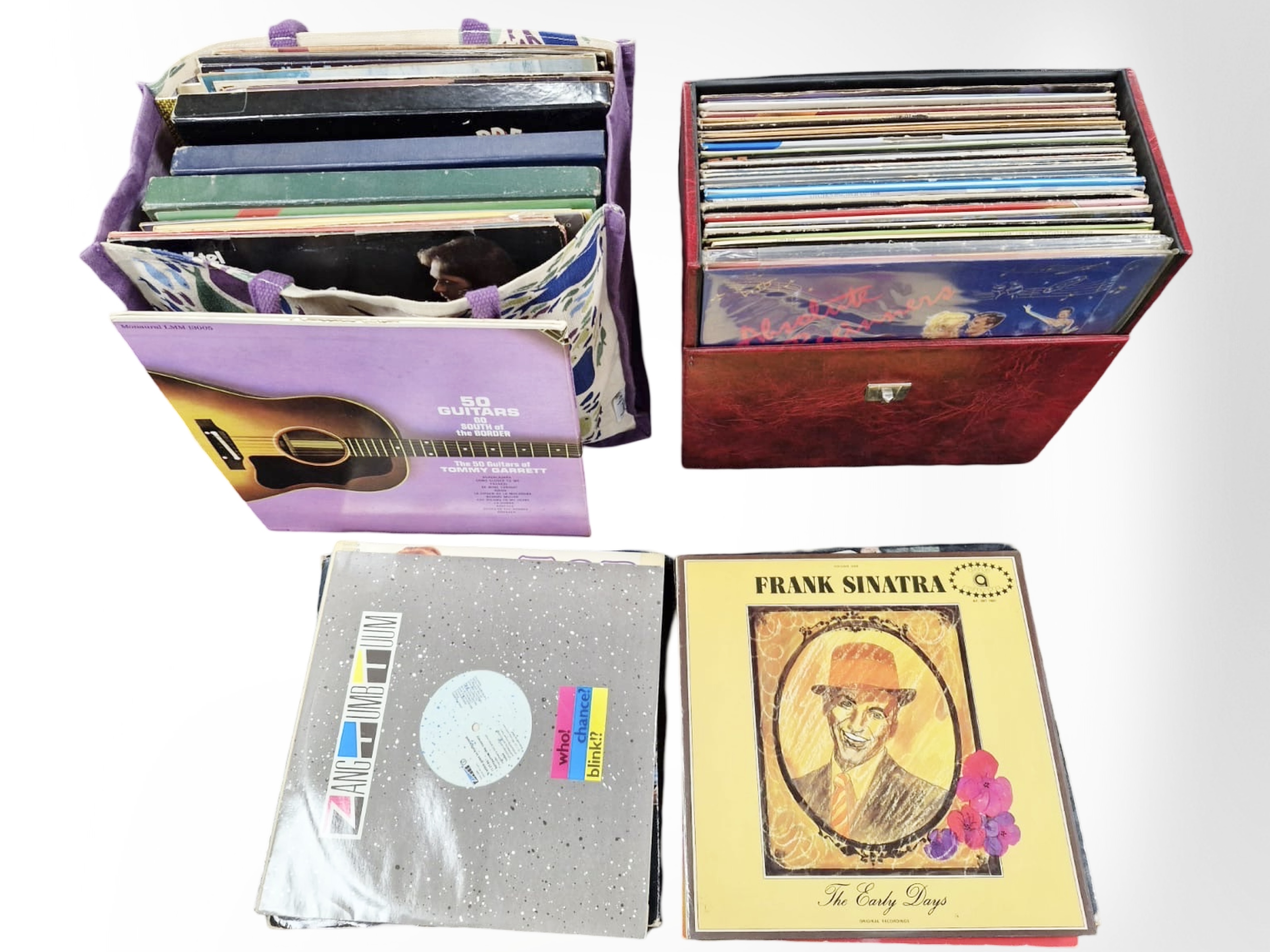 A case and bag of assorted LP records and box sets including Donna Summer, compilations, etc.