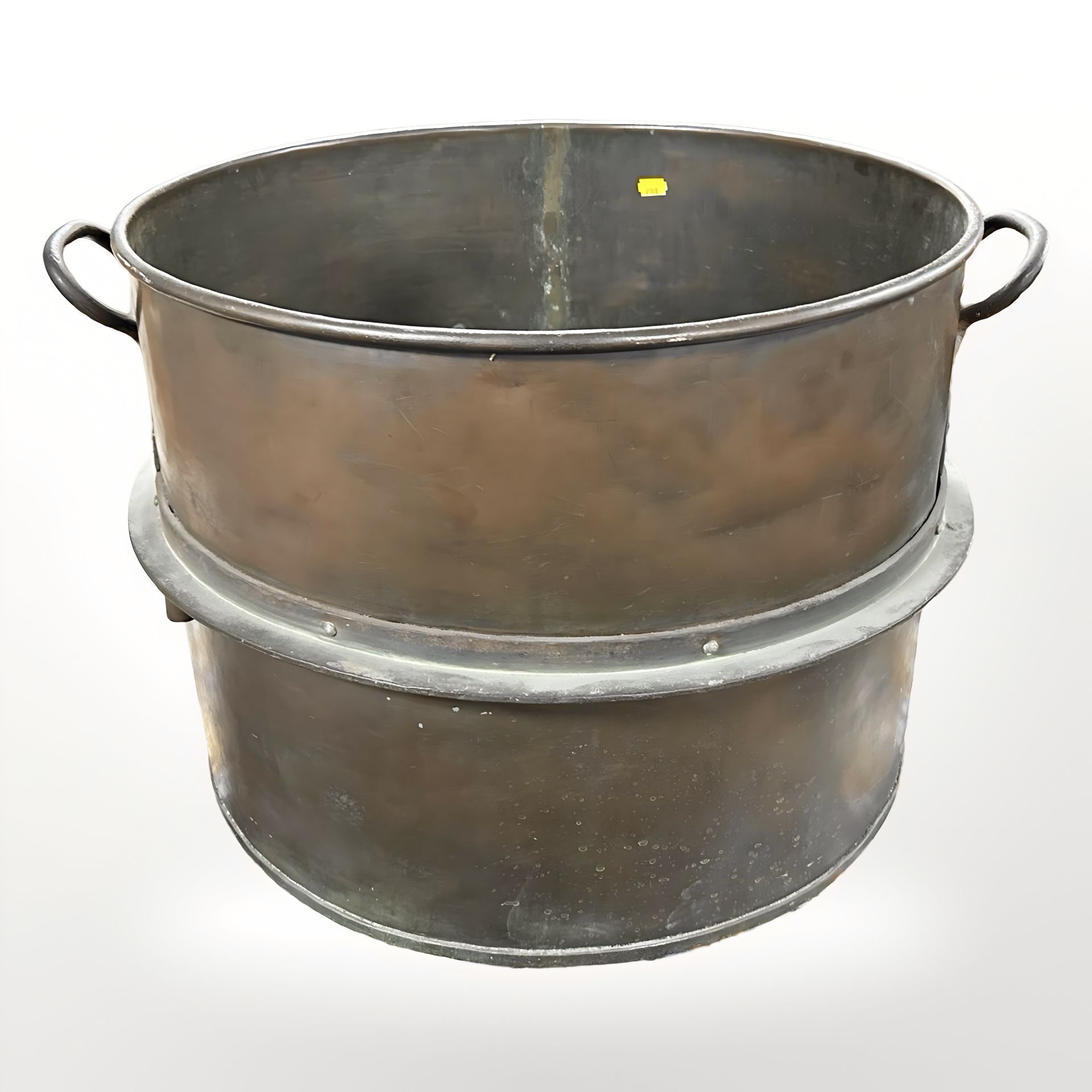 A 19th century patinated copper twin handled cooking pot, diameter 55 cm.