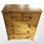 A pine six drawer chest,