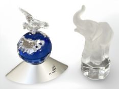 A limited edition coloured crystal Swarovski ornament of a dove on globe,