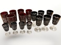 A group of ruby tinted glass including six beakers,