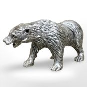 A sterling silver hollow cast figure of a grizzly bear, length 13 cm.