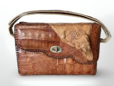 A crocodile skin hand bag