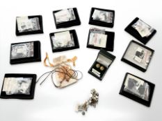 A group of Giani Jewellery silver charms in retail packaging, Sterling silver and other earrings.