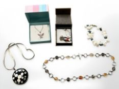 A group of jewellery including silver flat link necklace with pendant,