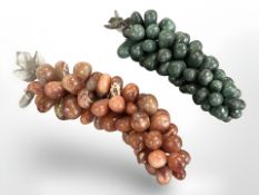 Two polished hard stone bunches of grapes in green and red