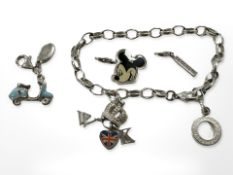 A Thomas Sabo Sterling silver charm bracelet and three further charms