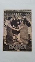 FOOTBALL, Ferenc Puskas signed magazine cut out, signature in blue ink, showing him pre-kick off