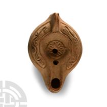 Roman Terracotta Oil Lamp with Floral Motif