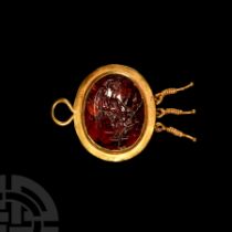 Roman Gold Pendant with Garnet Gemstone Depicting Victory