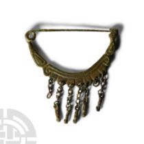 Etruscan Bronze Bow Brooch with Phallic Pendants