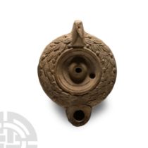 Roman Terracotta Oil Lamp with Wreath