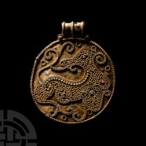 Viking Age Scandinavian Silver-Gilt Pendant with Regardant Beast