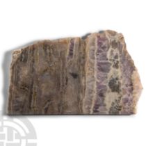 Natural History - Unpolished Cut Amethyst Crystal Geode Slice.