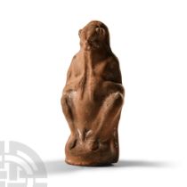 Boeotian Terracotta Figure of Satyr Playing an Aulos