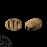 Egyptian Steatite Scaraboid Amulet with Royal Uraei and Vessel