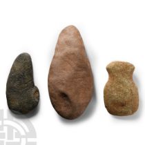 Native American Smoothing Stone and Axehead Group