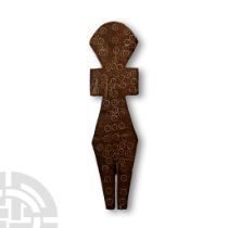 Egyptian Wooden Doll with Circular Decorations