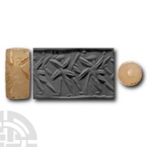 Neo Assyrian Cylinder Seal with Mythical Creatures Walking Left