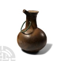 Western Asiatic Terracotta Vessel with Bronze Handle