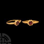 Post Medieval Gold Ring with Cabochon Garnet