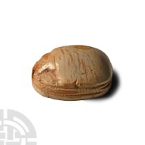 Egyptian White Stone Scarab with Uraei and Falcons