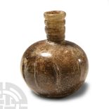 Western Asiatic Glass Ribbed Bottle