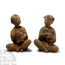 Chinese Wei Terracotta Seated Children Pair