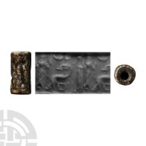 Western Asiatic Black Stone Cylinder Seal with Presentation Scene