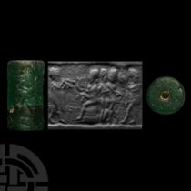 Western Asiatic Green Glass Cylinder Seal with Entertainment Scene