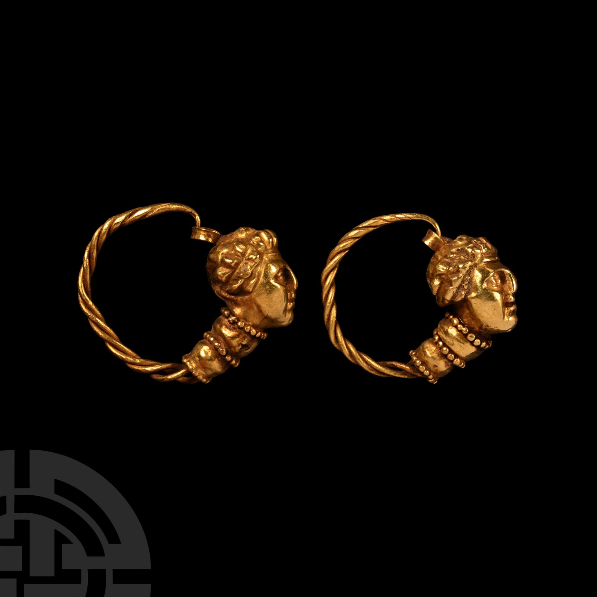 Hellenistic Gold Earrings with Female Heads